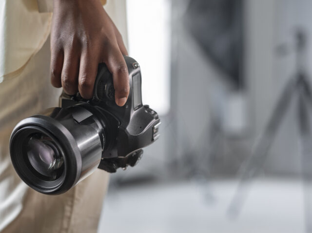 side-view-woman-with-photo-camera